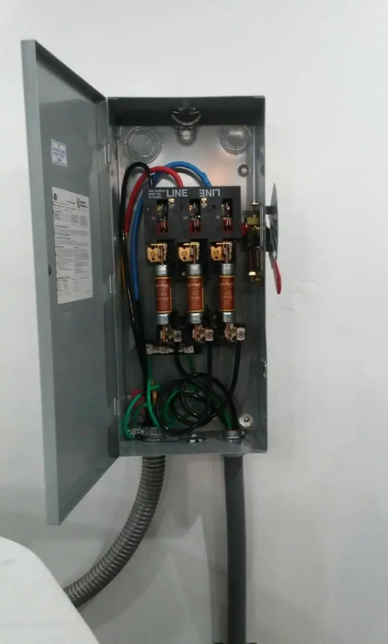 Three-phase disconnect switch installed for Smoke Detector Installation in Parma